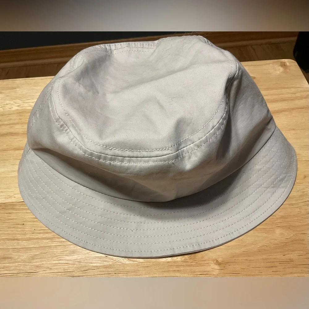 Girls Tan Bucket Hat with Daisy Flower Embroidery.